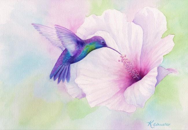 Pastel watercolor illustration of a hummingbird hovering beside a pale pink hibiscus flower, its beak reaching toward the bloom’s center against a soft, multicolored background, with an artist’s signature in the lower right corner.